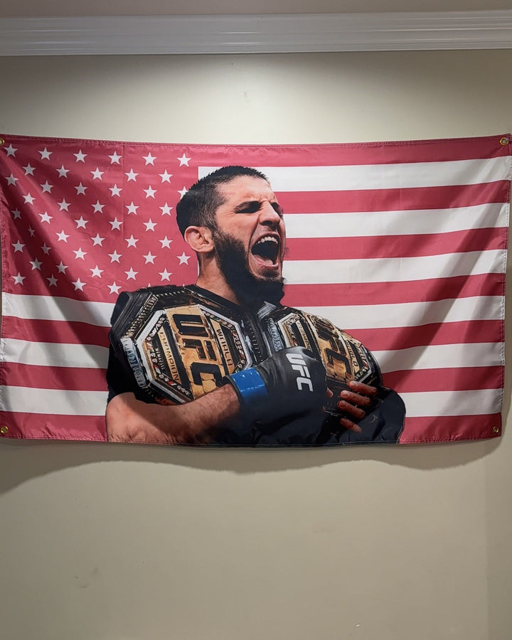 Islam Makhachev pink American flag hanging over a bed