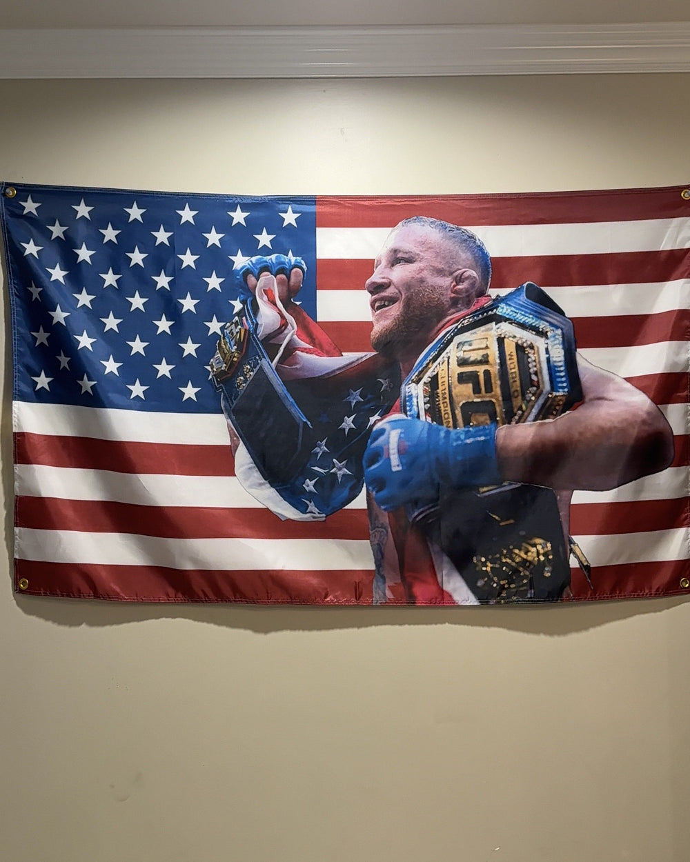Justin Gaethje American flag hanging over a bed